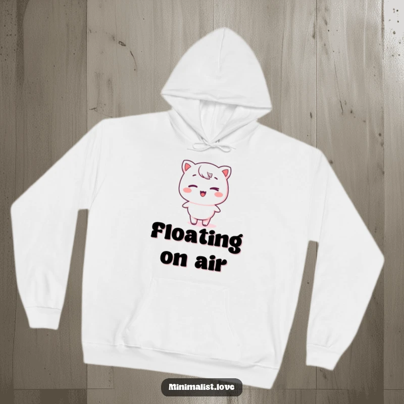 Funny kawaii character winking with a subtle expression on a stark plane, featured on a soft hoodie, radiating minimalist charm and comfort.