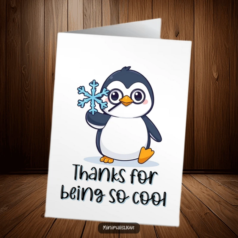 Funny Free Printable Thank You Card: Penguin with monocle balancing snowflake, elegantly saying thanks. Perfect DIY gift.