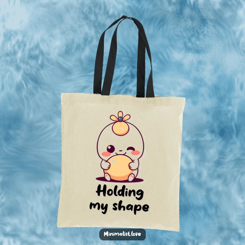 Funny kawaii character with a goofy grin playing with a simple shape, printed on a practical tote bag, ideal for cute and functional carrying.